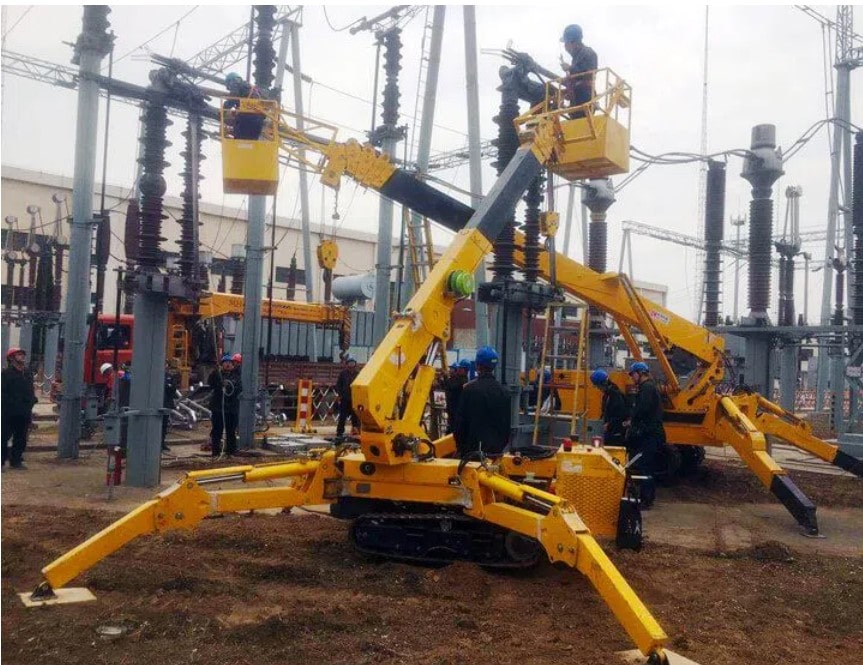 Using yellow mini spider crane rental for outdoor spaces and powerlines in the United States