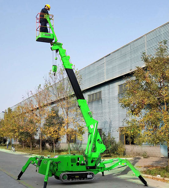 A green spider crane for outdoor use with a taller reach capacity for warehouses in the United States